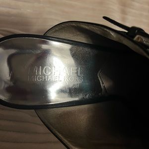 Turn heads with these Michael Kors, size 9 stilettos!